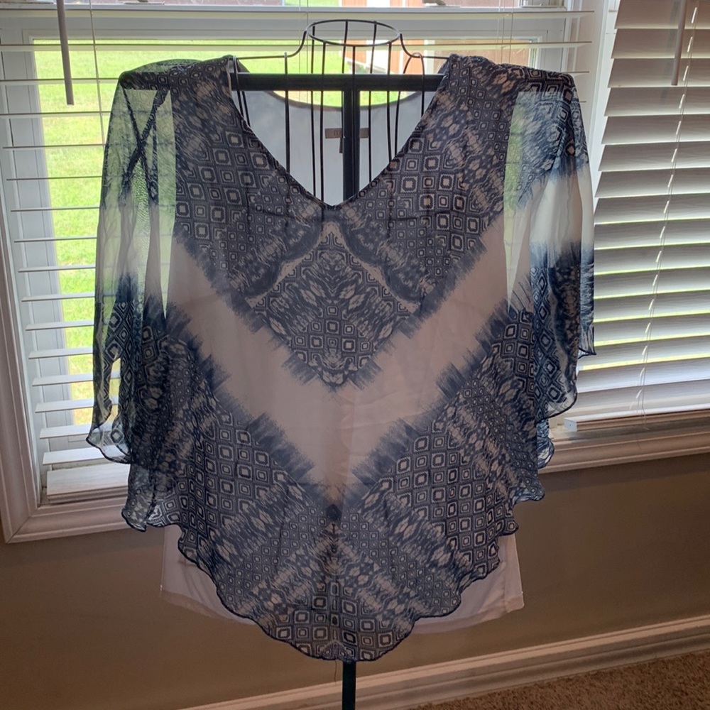 Cute flowing top would look great on anyone!